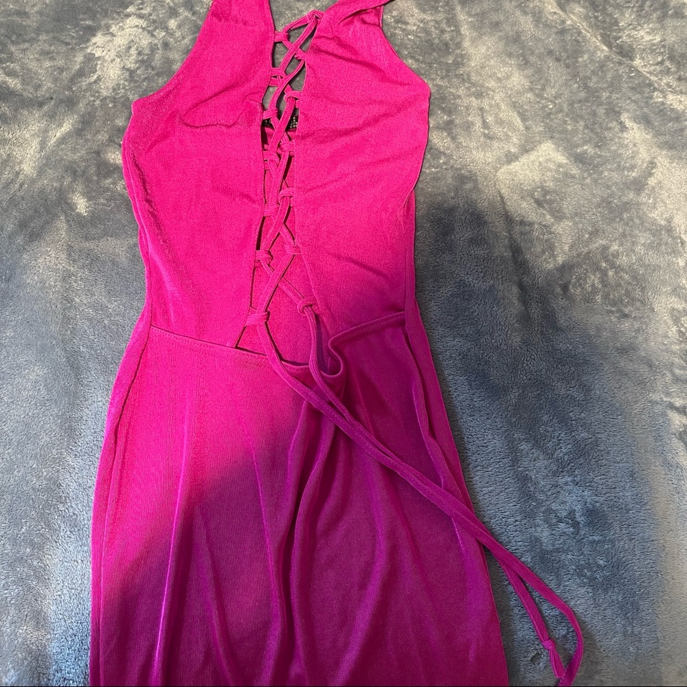 Hot Pink mini dress with crisscross in the cleavage area down to the front.